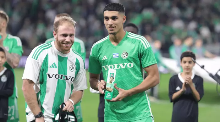 Anan Halaili with his personal award (Omari Stein)