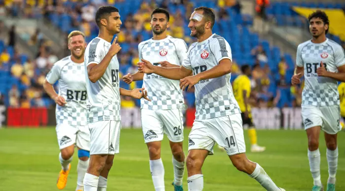 Hapoel Hadera players celebrate (Roi Kafir)