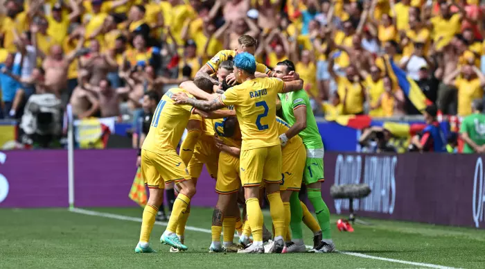 Romanian national team players celebrate (Reuters)