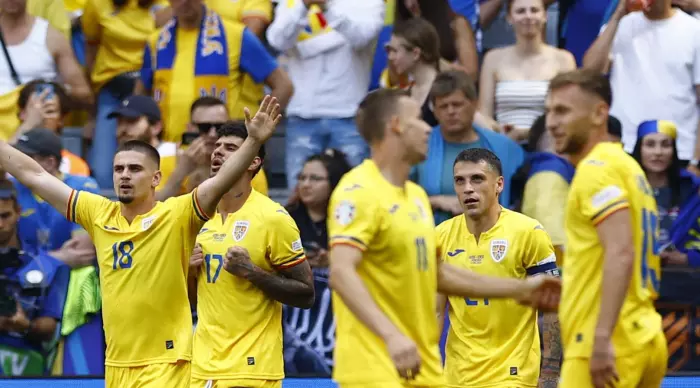 Romanian national team players celebrate (Reuters)