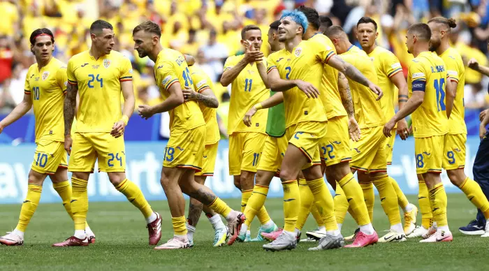 Romanian team players celebrate at the end (Reuters)