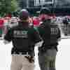 U.S. Secret Service police provide security before former President and 2024 presidential nominee Donald Trump and vice presidential nominee J.D. Vance speak at their first campaign rally together at Van Andel Arena in Grand Rapids, Mich., on Saturday.