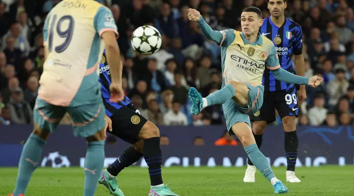 Phil Foden spins a kick (Reuters)