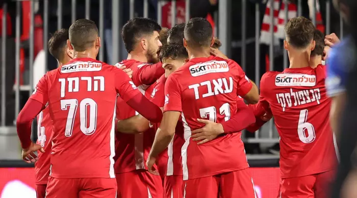 Hapoel Tel Aviv players celebrate with Stav Toriel (Radad Jabara)