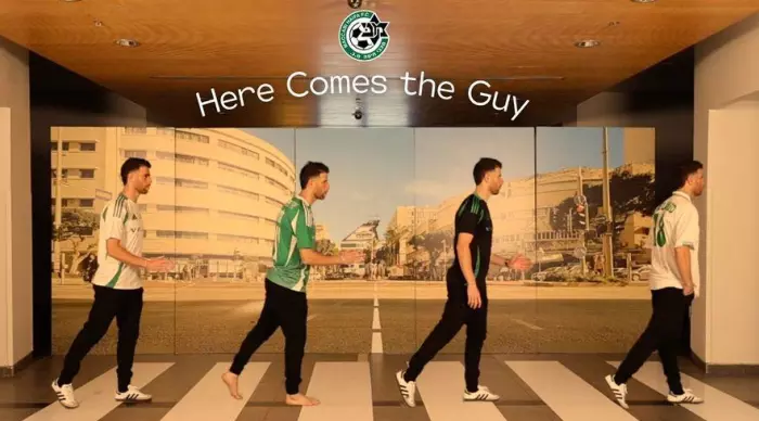 Guy Melamed crosses the road (Maccabi Haifa's official website)