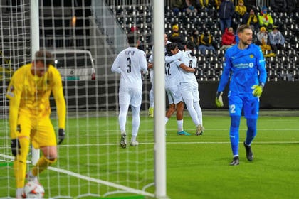 Maccabi Tel Aviv players celebrate the winning goal against Budo Glimt, tonight